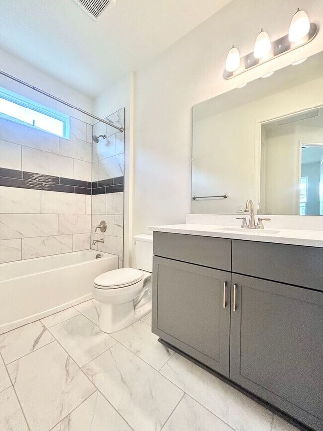 Building Photo - Gorgeous 4/3 Residence with a Private Back Lanai and a 3 Car Garage in the Delightful Laureate Pa...