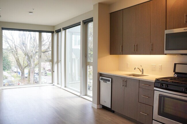 Building Photo - Corner 2nd Floor 1 Bdr w/Dishwasher, W&D, Condo Finishes!