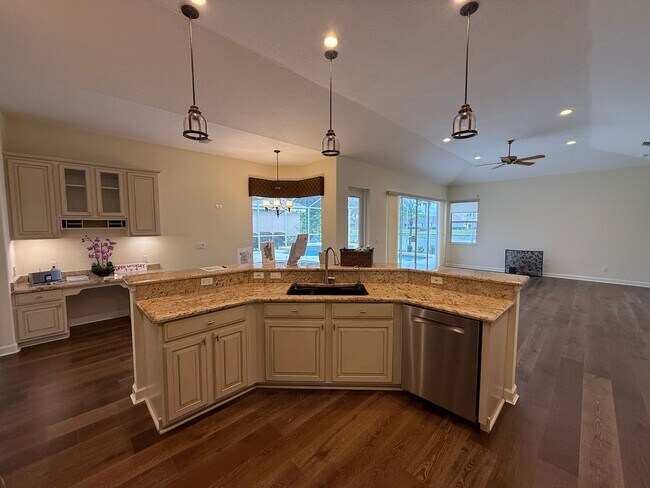 Building Photo - Luxurious 4 Bedroom 3 Bath Lakefront Pool Home W/3-Car Garage