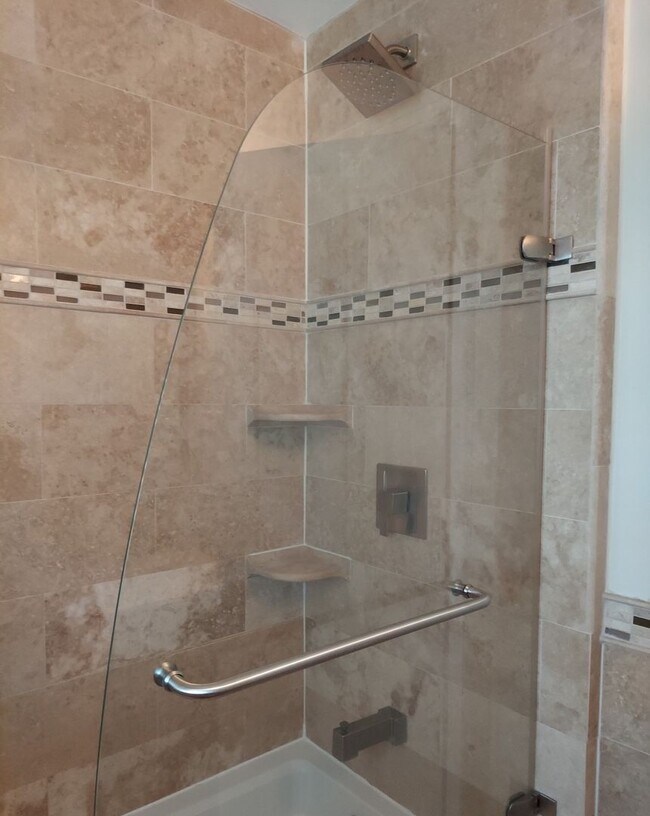 Building Photo - Stunning And Spacious 2-Level, 1 Bedroom, ...