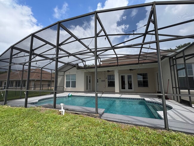 Building Photo - St. Cloud 4 Bedroom, 4 Bathroom Pool Home with Lake View
