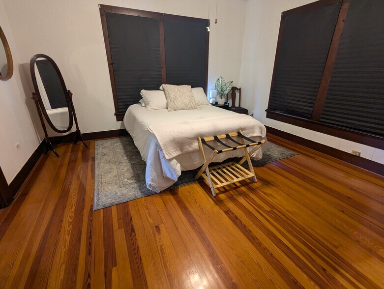 Bedroom 1 with master bath - 1114 E Old Pass Rd