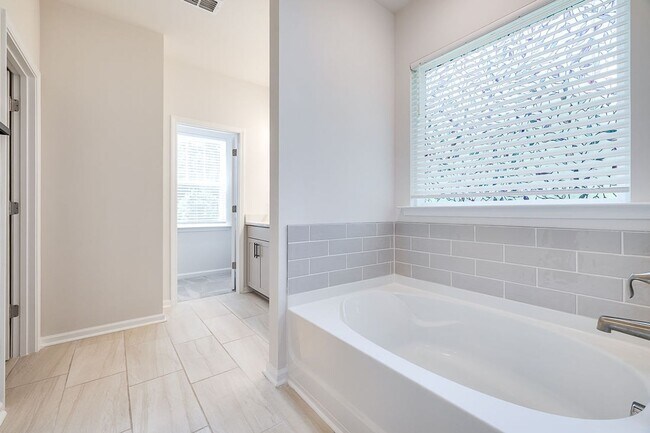 Building Photo - Beautiful Four Bedroom Home Now Available ...