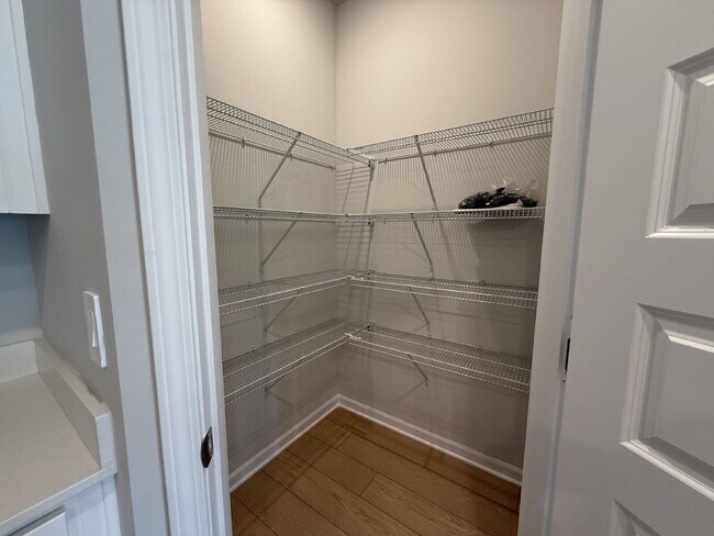 Building Photo - "NEWLY BUILT- Spacious 4-Bedroom Haven with Granite Elegance and Cozy Fireplace in Harvest"
