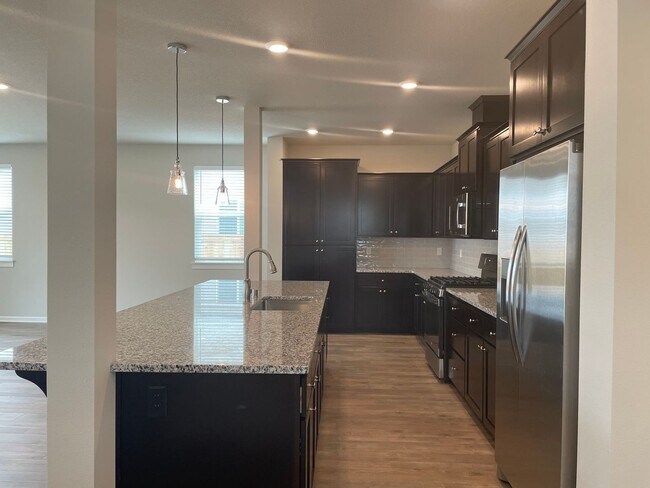 Building Photo - 4 Bed 2.5 Bath Home! Located near the Ridgefield Outdoor Recreation Center, equestrian facilities...