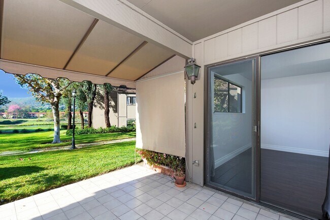 Building Photo - Lake and Golf Course View- Remodeled Condo w/ 2 Car Garage!