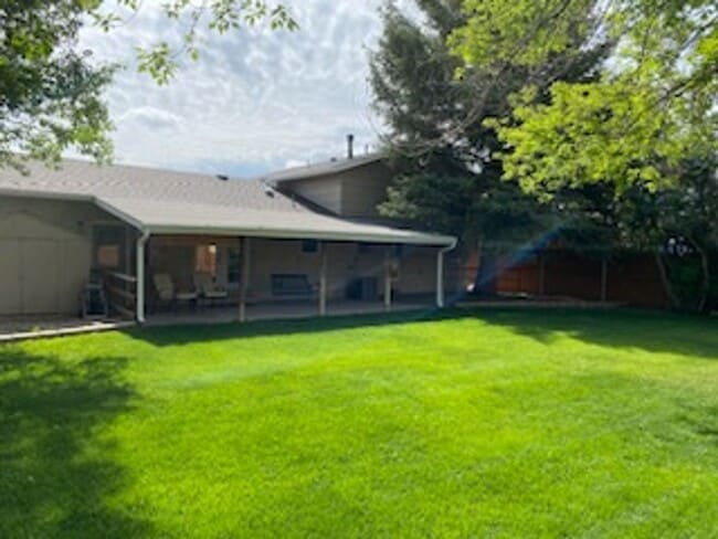 Building Photo - Beautiful 4 Bedroom Quad Level Located in Buffalo Ridge!!!!