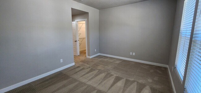 Building Photo - $2,000 OFF 4-bed, 3.5-bath Townhome Available Now!