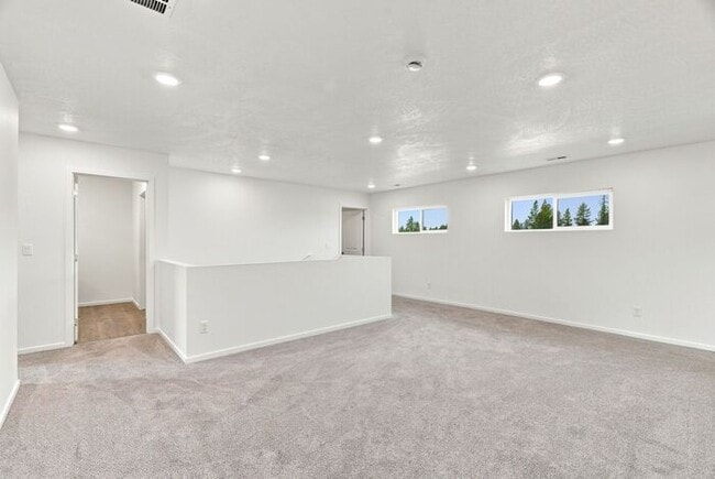 Building Photo - Spacious 5-Bedroom with Loft with 3-Car Garage