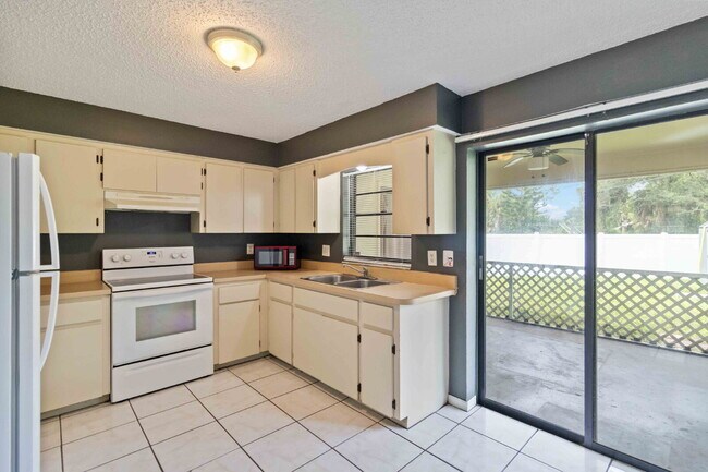 Building Photo - "Charming 2-Bedroom Duplex in Port Charlot...