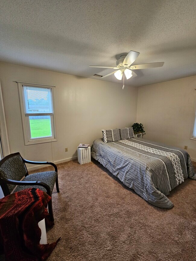 Primary room with view of backyard - 404 Rams Rd