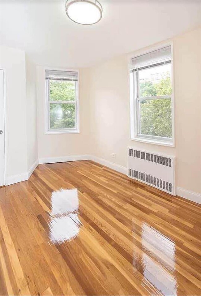 Building Photo - 55-05 Woodside Ave