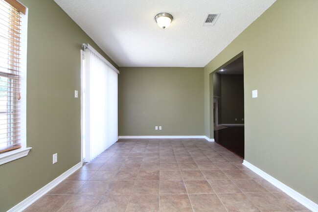 Building Photo - Executive 3-Bedroom Brick Home with Florid...