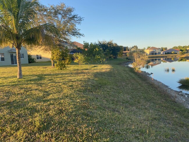 Building Photo - Gated Lake Front- 4 Bedrooms with loft- 3 ...