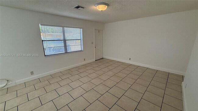 Building Photo - 6421 NW 20th Ct
