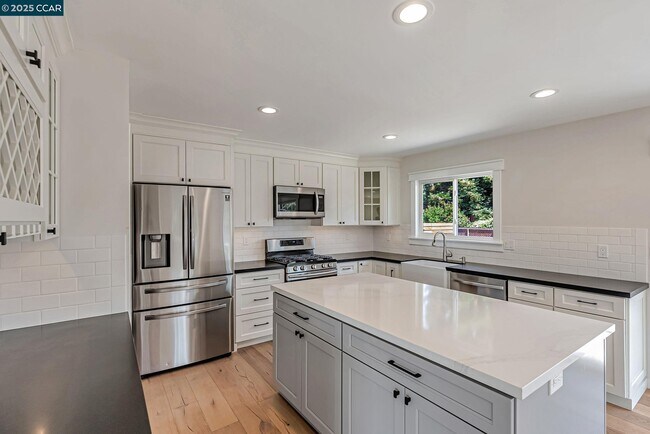 Building Photo - 5891 Caulfield Dr
