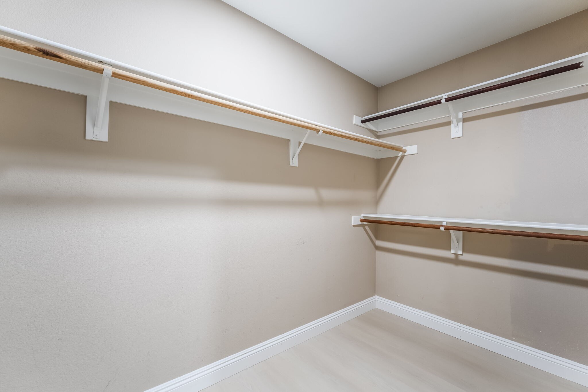 Walk in closet featuring light wood-style flooring - 1179 Antoinette St