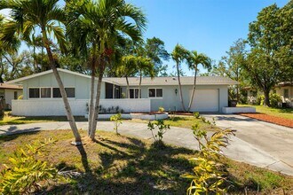 Building Photo - Completely Refurbished 3 Bedroom 2 bath with Florida Room Large backyard