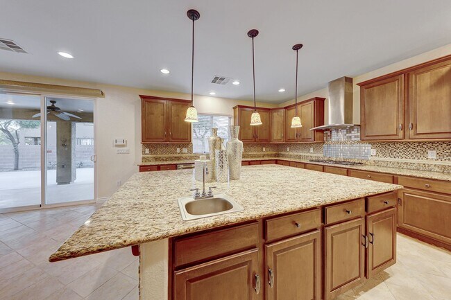 Building Photo - 5 Bedroom Corner Lot Home in Gated Community!