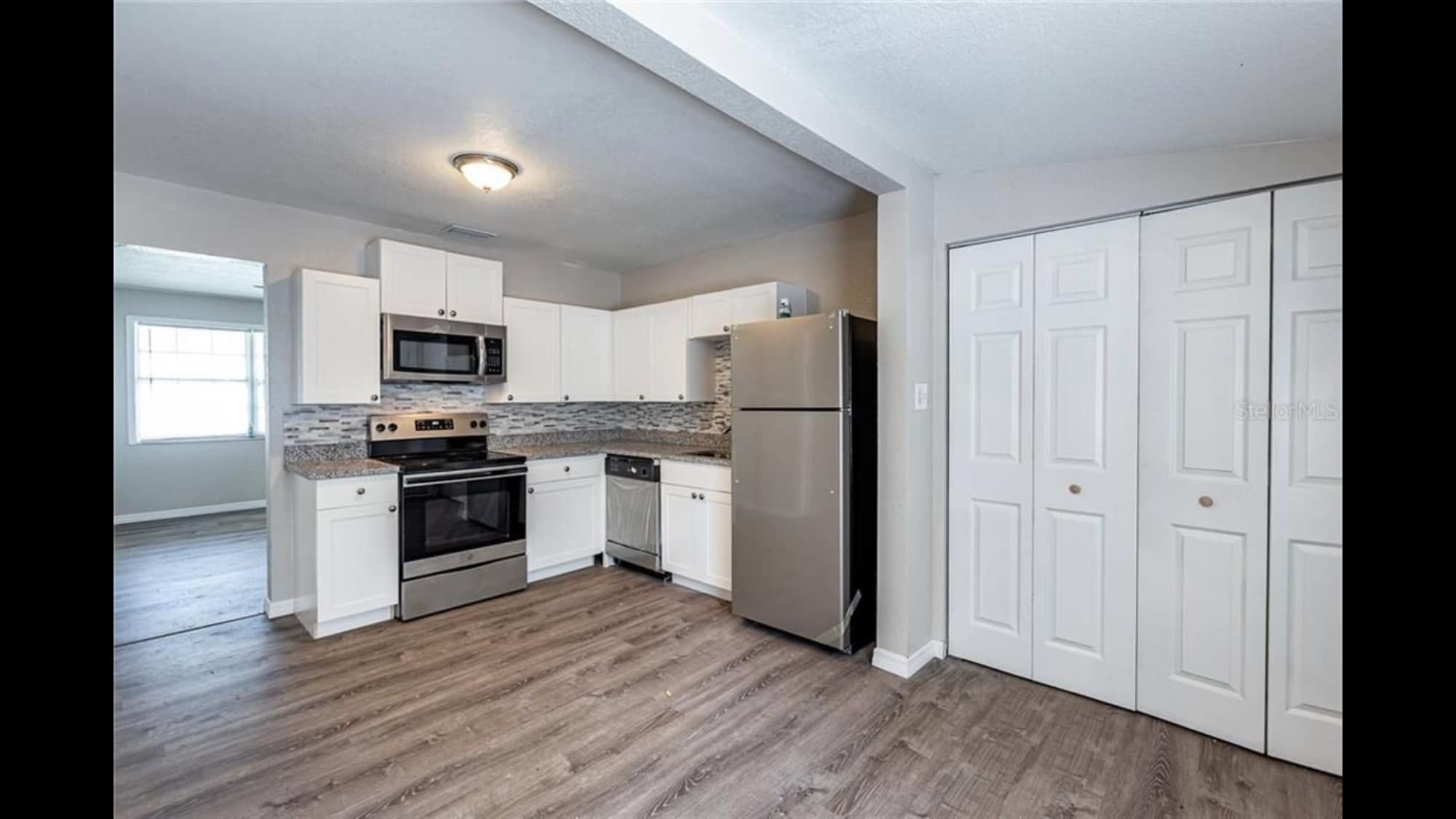 Kitchen + laundry nook - 1526 28th St N