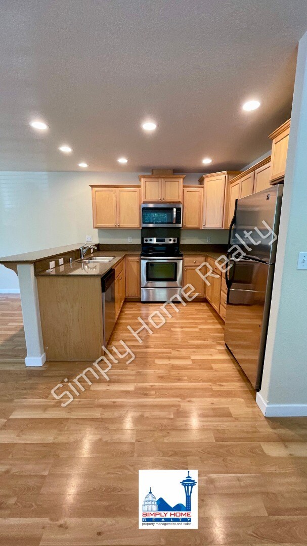 Building Photo - Welcome to Your Corner-Lot Retreat!