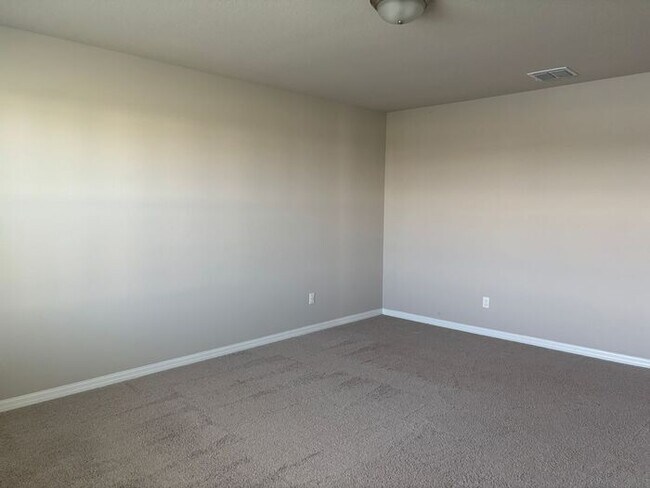 Building Photo - Like-New 4 Bedroom 3 Bath with Pond View & Two Living Spaces — Minutes to South Lake Nona