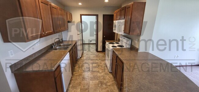 Building Photo - Single Level 2 Bed Half-Duplex with Attached Garage