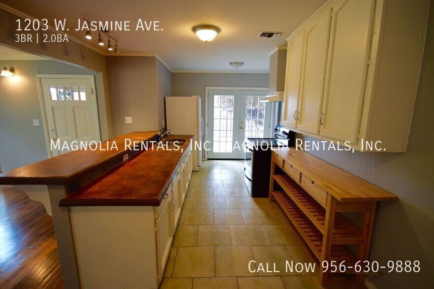 Building Photo - 1203 Jasmine Ave W