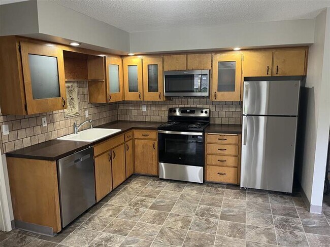 Building Photo - COMING SOON--Beautiful 3 Bedroom with a Living Room, Family Room, Fenced Yard & More!