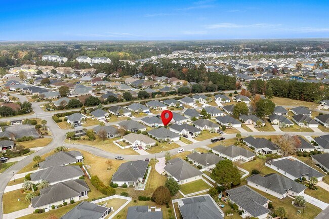 Building Photo - Live the Coastal Lifestyle in This Cypress Keys Beauty!