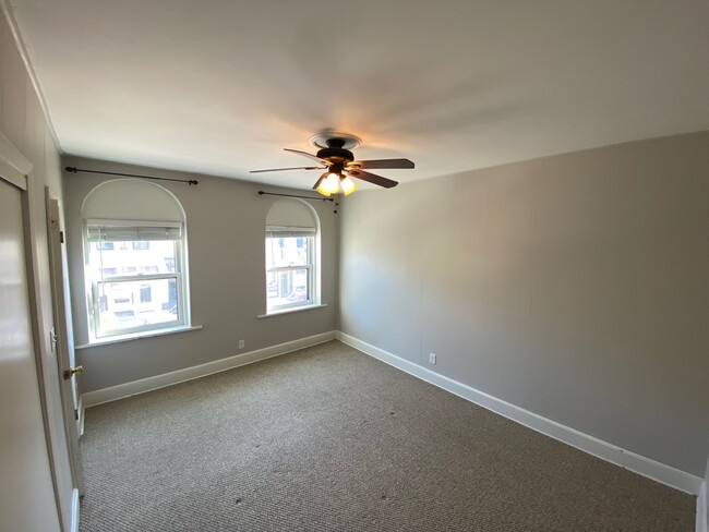 Front bedroom with natural light overlooking downtown Port Washington - 225 N Franklin St