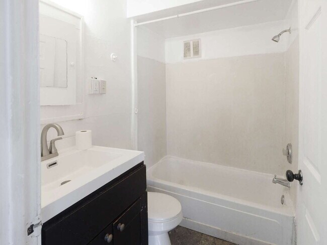 Building Photo - Section 8 approved! - 3 Bed Lower Level Duplex Available Now