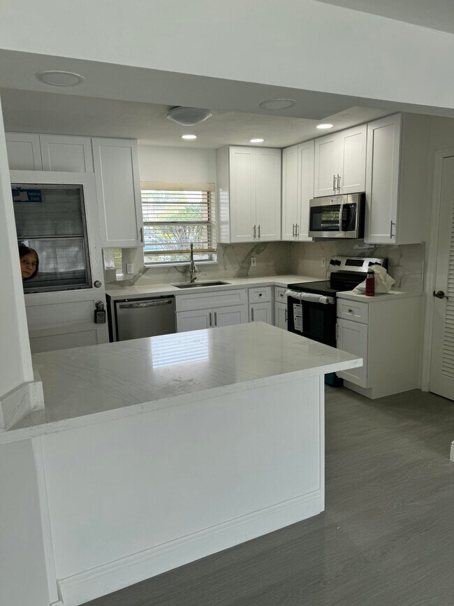 Building Photo - 10821 N Military Trl