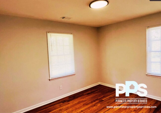 Building Photo - 6127-6129 E Fayetteville Dr