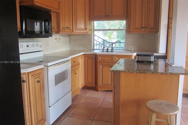 Building Photo - 4850 SW 63rd Terrace