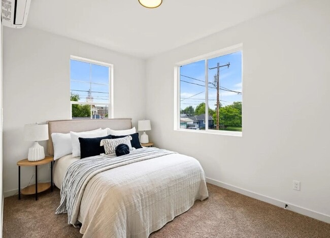 Building Photo - St. Johns New Build - Bright and Spacious End Unit 2 Bedroom with A/C, Washer/Dryer and Private P...