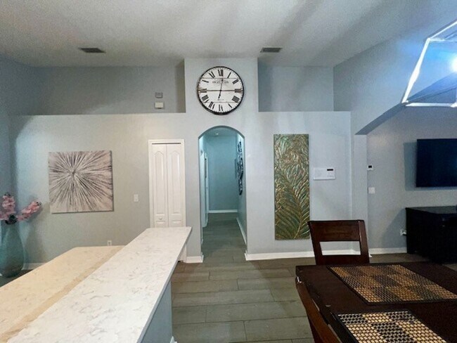 Building Photo - Lake Nona!! Spectacular 4X2 in Gated Nona Crest! All tile flooring!! 2 car garage! Move in April ...