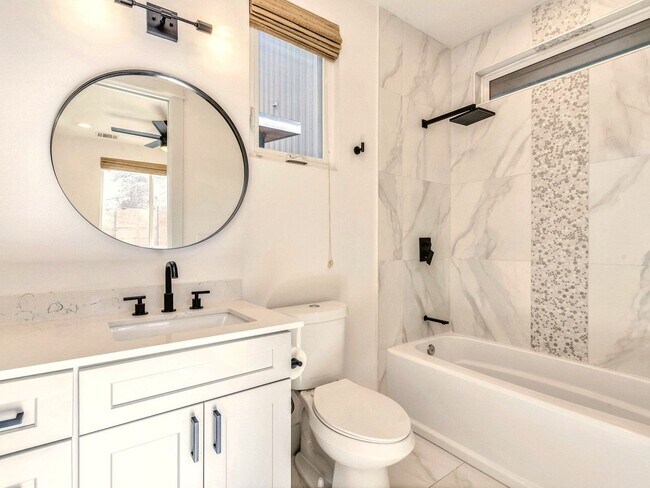 Building Photo - Stylish 2-Bedroom Home with Modern Bathrooms & Private Yard