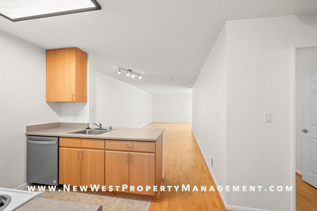 Building Photo - Charming Little Italy 1-Bedroom at Portico! Small Pet OK! Available Now!