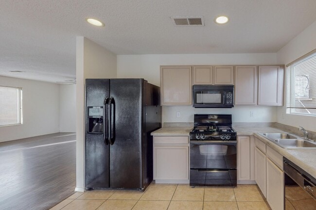 Building Photo - 6056 Malpais Park Ave NW