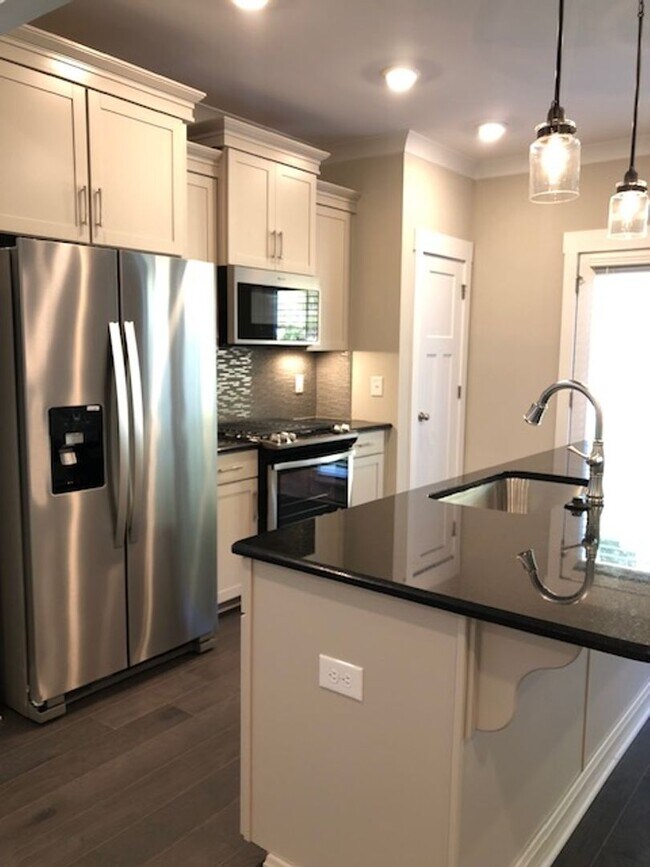 Building Photo - Brand New END UNIT North of Main St  3 miles from Downtown Greenville and I-385.