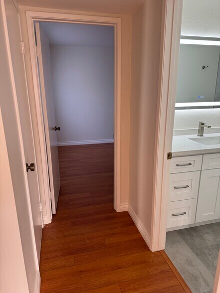 Hallway with Main Bathroom - 10512 Sunland Blvd