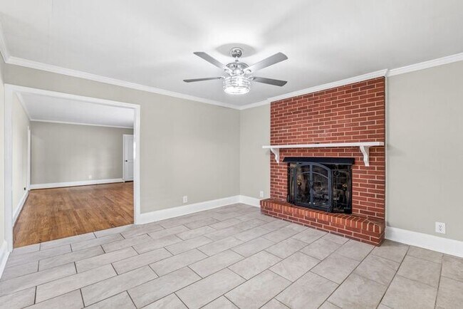 Building Photo - Elon - Large Brick Home, Hardwoods, Granite Counter-Tops, SS Appliances, Fire Place, Carport - Mu...