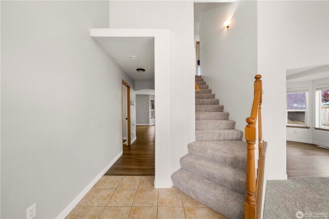 Building Photo - Enjoy this 3 bedroom, 2.5 bath home in the gated community of Stonerise