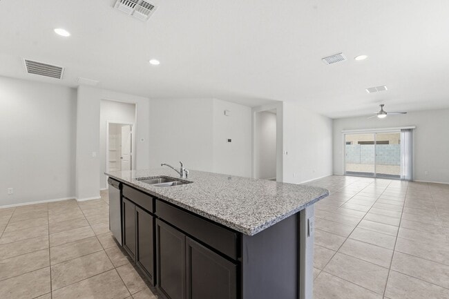 Building Photo - Stylish 3BR Home with Granite Counters + Community Parks & Splash Pads