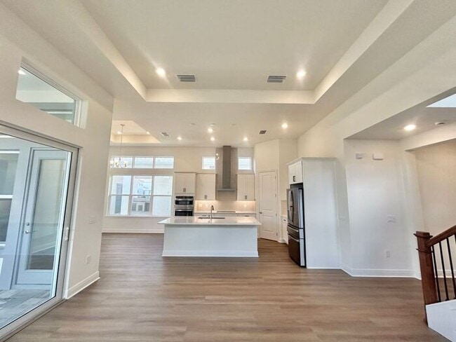 Building Photo - Gorgeous 4/3 Residence with a Private Back Lanai and a 3 Car Garage in the Delightful Laureate Pa...