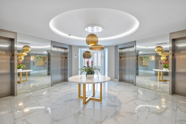 Building Photo - 10275 Collins Ave