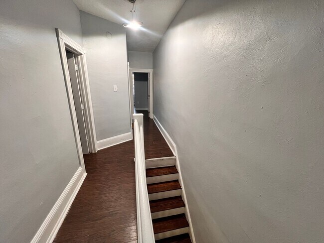 Building Photo - Updated 3 Bedroom 1.5 Bath Townhome w/ Paved Yard + Washer & Dryer