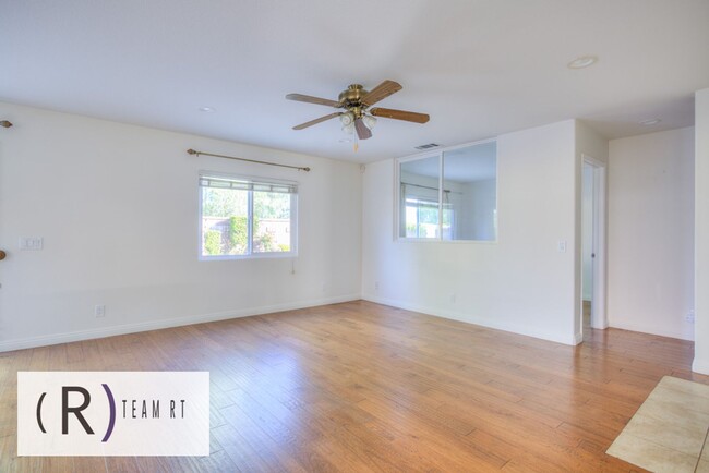 Building Photo - A Captivating and Charming 2 Story Home Ne...