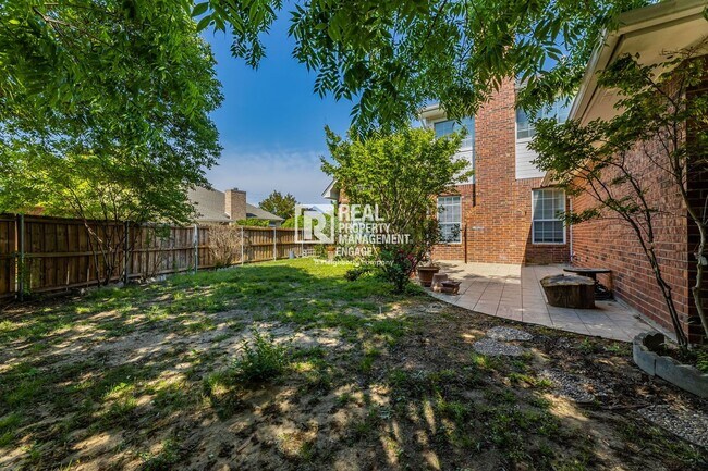 Building Photo - Recently Updated Plano Property with Modern Features and Serene Surroundings